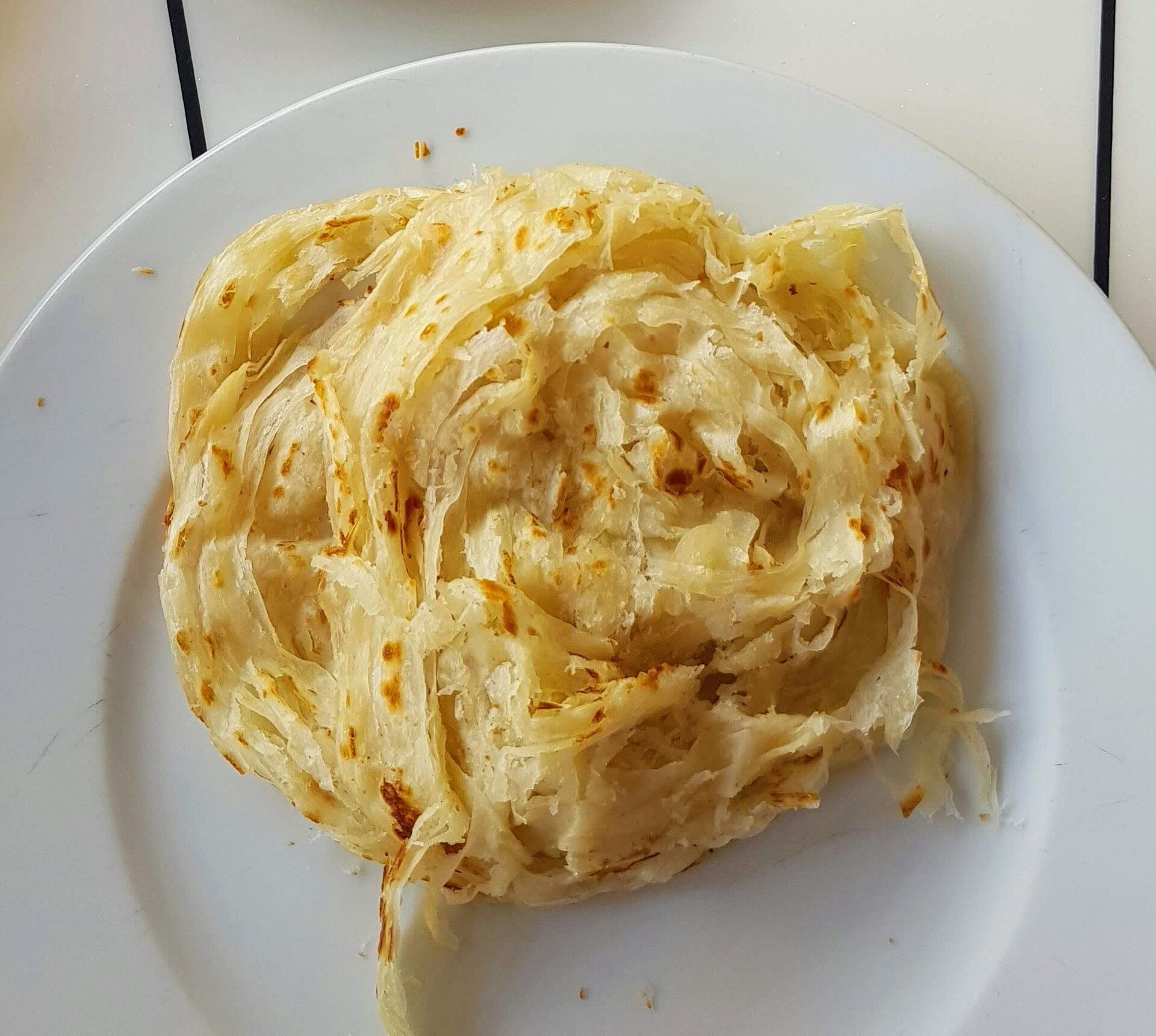 Kerala Parotta with Curry — non-vegetarian Munnar dish